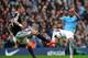 MANCHESTER, ENGLAND - APRIL 05: Morgan Schneiderlin of Southampton and Fernandinho of Manchester City compete for the ball during the Barclays Premier League match between Manchester City and Southampton at Etihad Stadium on April 5, 2014 in Manchester,
