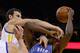OAKLAND, CA - NOVEMBER 14: Andrew Bogut #12 of the Golden State Warriors fouls Serge Ibaka #9 of the Oklahoma City Thunder at ORACLE Arena on November 14, 2013 in Oakland, California. NOTE TO USER: User expressly acknowledges and agrees that, by downloa