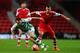SOUTHAMPTON, ENGLAND - JANUARY 25: James Hayter (L) of Yeovil Town and Morgan Schneiderlin (R) of Southampton challenge for the ball during the FA Cup Fourth Round match between Southampton and Yeovil Town at St Mary's Stadium on January 25, 2014 in South