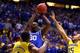 INDIANAPOLIS, IN - MARCH 30: Julius Randle #30 of the Kentucky Wildcats shoots the ball aginst Jon Horford #15 of the Michigan Wolverines in the first half during the midwest regional final of the 2014 NCAA Men's Basketball Tournament at Lucas Oil Stadiu