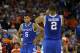 ATLANTA, GA - MARCH 16: Aaron Harrison #2 and Andrew Harrison #5 of the Kentucky Wildcats react in the second half against the Florida Gators during the Championship game of the 2014 Men's SEC Basketball Tournament at Georgia Dome on March 16, 2014 in At