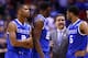 INDIANAPOLIS, IN - MARCH 28: Head coach John Calipari of the Kentucky Wildcats talks with Aaron Harrison #2, Alex Poythress #22 and Andrew Harrison #5 against the Louisville Cardinals during the regional semifinal of the 2014 NCAA Men's Basketball Tourna