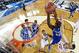 ARLINGTON, TX - APRIL 05: Alex Poythress #22 of the Kentucky Wildcats goes up for a shot as Sam Dekker #15 of the Wisconsin Badgers defends during the NCAA Men's Final Four Semifinal at AT&T Stadium on April 5, 2014 in Arlington, Texas. (Photo by Chris St