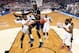 ARLINGTON, TX - APRIL 05: Kasey Hill #0 of the Florida Gators goes to the basket as Amida Brimah #35 of the Connecticut Huskies defends during the NCAA Men's Final Four Semifinal at AT&T Stadium on April 5, 2014 in Arlington, Texas. (Photo by Chris Steppi