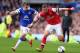 LIVERPOOL, ENGLAND - APRIL 06: Seamus Coleman of Everton competes with Lukas Podolski of Arsenal during the Barclays Premier League match between Everton and Arsenal at Goodison Park on April 6, 2014 in Liverpool, England. (Photo by Alex Livesey/Getty I
