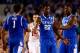 ARLINGTON, TX - APRIL 05: Alex Poythress #22 celebrates with James Young #1 and Julius Randle #30 of the Kentucky Wildcats during the NCAA Men's Final Four Semifinal against the Wisconsin Badgers at AT&T Stadium on April 5, 2014 in Arlington, Texas. (Pho