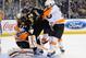 BOSTON, MA - APRIL 5: David Krejci #46 of the Boston Bruins gets shoved against Ray Emery #29 and Zac Rinaldo #36 of the Philadelphia Flyers at the TD Garden on April 5, 2014 in Boston, Massachusetts. (Photo by Brian Babineau/NHLI via Getty Images)