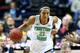 NASHVILLE, TN - APRIL 06: Kayla McBride #21 of the Notre Dame Fighting Irish handles the ball in the second half against the Maryland Terrapins during the NCAA Women's Final Four semifinal at Bridgestone Arena on April 6, 2014 in Nashville, Tennessee. (
