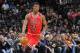 SAN ANTONIO, TX - January 29: Jimmy Butler #21 of the Chicago Bulls dribbles up the court against the San Antonio Spurs during the game at the AT&T Center on January 29, 2014 in San Antonio, Texas. NOTE TO USER: User expressly acknowledges and agrees that