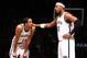 BROOKLYN, NY - MARCH 3: Paul Pierce #34 of the Brooklyn Nets speaks with Shaun Livingston #14 of the Brooklyn Nets during a game at the Barclays Center on March 3, 2014 in the Brooklyn borough of New York City. NOTE TO USER: User expressly acknowledges a