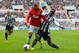 NEWCASTLE UPON TYNE, ENGLAND - APRIL 05: Massadio Haidara of Newcastle United tackles Ashley Young of Manchester United during the Barclays Premier League match between Newcastle United and Manchester United at St James' Park on April 5, 2014 in Newcast