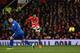 MANCHESTER, ENGLAND - JANUARY 28: Ashley Young of Manchester United scores his team's second goal during the Barclays Premier League match between Manchester United and Cardiff City at Old Trafford on January 28, 2014 in Manchester, England. (Photo by