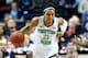 NASHVILLE, TN - APRIL 06: Kayla McBride #21 of the Notre Dame Fighting Irish handles the ball in the second half against the Maryland Terrapins during the NCAA Women's Final Four semifinal at Bridgestone Arena on April 6, 2014 in Nashville, Tennessee. (