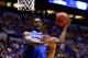 INDIANAPOLIS, IN - MARCH 30: Julius Randle #30 of the Kentucky Wildcats shoots the ball over Jordan Morgan #52 of the Michigan Wolverines in the first half during the midwest regional final of the 2014 NCAA Men's Basketball Tournament at Lucas Oil Stadiu