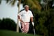 DUBAI, UNITED ARAB EMIRATES - JANUARY 30: John Daly of the USA looks on during the first round of the 2014 Omega Dubai Desert Classic on the Majlis Course at the Emirates Golf Club on January 30, 2014 in Dubai, United Arab Emirates. (Photo by Francois N