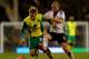 LONDON, ENGLAND - JANUARY 14: Luciano Becchio of Norwich City battles with Pajtim Kasami of Fulham during the FA Cup with Budweiser Third round replay match between Fulham and Norwich City at Craven Cottage on January 14, 2014 in London, England. (Photo
