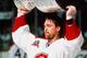 MONTREAL - 1993: Patrick Roy #33 of the Montreal Canadiens raises Stanley Cup in celebration after defeating the Los Angeles Kings in game at the Montreal Forum. (Photo by Steve Babineau/NHLI via Getty Images)