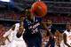 ARLINGTON, TX - APRIL 05: Amida Brimah #35 of the Connecticut Huskies goes for a loose ball against the Florida Gators during the NCAA Men's Final Four Semifinal at AT&T Stadium on April 5, 2014 in Arlington, Texas. (Photo by Tom Pennington/Getty Images)