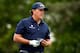 HUMBLE, TX - APRIL 05: Phil Mickelson of the United States looks on from the eighteenth hole during round three of the Shell Houston Open at the Golf Club of Houston on April 5, 2014 in Humble, Texas. (Photo by Scott Halleran/Getty Images)