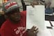 Guillard holds his new WSOF contract