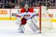 WINNIPEG, MB - MARCH 22: Goaltender Cam Ward #30 of the Carolina Hurricanes keeps an eye on the play as he guards the net during third period action against the Winnipeg Jets at the MTS Centre on March 22, 2014 in Winnipeg, Manitoba, Canada. The Canes def