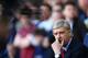 LONDON, ENGLAND - MARCH 16: Arsene Wenger manager of Arsenal looks on during the Barclays Premier League match between Tottenham Hotspur and Arsenal at White Hart Lane on March 16, 2014 in London, England. (Photo by Paul Gilham/Getty Images)