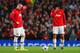 MANCHESTER, ENGLAND - APRIL 01: A dejected Wayne Rooney of Manchester United and Marouane Fellaini of Manchester United look on after conceding a goal during the UEFA Champions League Quarter Final first leg match between Manchester United and FC Bayern