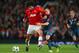MANCHESTER, ENGLAND - APRIL 01: Marouane Fellaini of Manchester United and Franck Ribery of Bayern Muenchen battle for the ball during the UEFA Champions League Quarter Final first leg match between Manchester United and FC Bayern Muenchen at Old Traffor