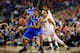 ARLINGTON, TX - APRIL 07: Shabazz Napier #13 of the Connecticut Huskies defends against Aaron Harrison #2 of the Kentucky Wildcats during the NCAA Men's Final Four Championship at AT&T Stadium on April 7, 2014 in Arlington, Texas. (Photo by Jamie Squire/