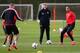 MANCHESTER, ENGLAND - APRIL 08: David Moyes the manager of Manchester United looks on as Rio Ferdinand passes the ball during a training session at Aon Training Complex on April 8, 2014 in Manchester, England. (Photo by Alex Livesey/Getty Images)