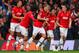 MANCHESTER, ENGLAND - APRIL 01: Nemanja Vidic of Manchester United celebrates with team mates after scoring their first goal during the UEFA Champions League Quarter Final first leg match between Manchester United and FC Bayern Muenchen at Old Trafford on