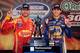 FORT WORTH, TX - APRIL 04: Chase Elliott, driver of the #9 NAPA Auto Parts Chevrolet, celebrates in victory lane with Dale Earnhardt Jr., driver of the #88 Ragu Chevrolet, after winning the NASCAR Nationwide Series O'Reilly Auto Parts 300 at Texas Motor