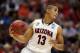 ANAHEIM, CA - MARCH 27: Nick Johnson #13 of the Arizona Wildcats with the ball in the first half against the San Diego State Aztecs during the regional semifinal of the 2014 NCAA Men's Basketball Tournament at the Honda Center on March 27, 2014 in Anahei