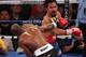 LAS VEGAS, NV - JUNE 09: (L-R) Timothy Bradley lands a right to the head of Manny Pacquiao during their WBO welterweight title fight at MGM Grand Garden Arena on June 9, 2012 in Las Vegas, Nevada. (Photo by Jeff Bottari/Getty Images)
