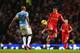 MANCHESTER, ENGLAND - DECEMBER 26: Philippe Coutinho of Liverpool controls the ball as he takes on Fernandinho of Manchester City during the Barclays Premier League match between Manchester City and Liverpool at Etihad Stadium on December 26, 2013 in Man
