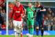 MANCHESTER, ENGLAND - APRIL 01: Bastian Schweinsteiger of Bayern Muenchen argues with Wayne Rooney of Manchester United after he received a red card during the UEFA Champions League Quarter Final first leg match between Manchester United and FC Bayern Mu