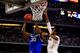 ARLINGTON, TX - APRIL 07: Julius Randle #30 of the Kentucky Wildcats goes to the basket as DeAndre Daniels #2 of the Connecticut Huskies defends during the NCAA Men's Final Four Championship at AT&T Stadium on April 7, 2014 in Arlington, Texas. (Photo by