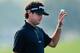 ORLANDO, FL - MARCH 20: Bubba Watson of the United States waves after making a putt for par on the 12th hole during the first round of the Arnold Palmer Invitational presented by MasterCard at the Bay Hill Club and Lodge on March 20, 2014 in Orlando, Flo