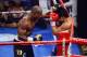 Jun. 9, 2012; Las Vegas, NV, USA; Timothy Bradley Jr (left) punches Manny Pacquiao during a welterweight championship bout at the MGM Grand Garden Arena. Mandatory Credit: Mark J. Rebilas-USA TODAY Sports