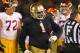 SOUTH BEND, IN - OCTOBER 19: Louis Nix III #1 of the Notre Dame Fighting Irish celebrates near the end of the game against the University of Southern California Trojans at Notre Dame Stadium on October 19, 2013 in South Bend, Indiana. Notre Dame defeated