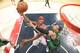WASHINGTON, DC - APRIL 2: Al Harrington #7 of the Washington Wizards shoots against Jared Sullinger #7 of the Boston Celtics during the game at the Verizon Center on April 2, 2014 in Washington, DC. NOTE TO USER: User expressly acknowledges and agrees tha