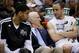 Apr 2, 2014; San Antonio, TX, USA; San Antonio Spurs guard Manu Ginobili (right), and head coach Gregg Popovich (center), and Tim Duncan (left) talk on the bench during the second half against the Golden State Warriors at AT&T Center. The Spurs won 111-90