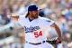GLENDALE, AZ - MARCH 10: Relief pitcher Chris Perez #54 of the Los Angeles Dodgers pitches against the Oakland Athletics during the spring training game at Camelback Ranch on March 10, 2014 in Glendale, Arizona. (Photo by Christian Petersen/Getty Images