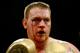 LONDON, ENGLAND - OCTOBER 09: Danny Hughes of Sunderland bleeds from a cut after being hit by Michael Sprott of Reading during the Prizefighter Heavyweights IV Final at York Hall on October 9, 2010 in London, England. (Photo by Dean Mouhtaropoulos/Getty