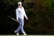 AUGUSTA, GA - APRIL 08: Rory McIlroy of Northern Ireland walks across a green during a practice round prior to the start of the 2014 Masters Tournament at Augusta National Golf Club on April 8, 2014 in Augusta, Georgia. (Photo by Harry How/Getty Images)