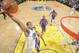 OAKLAND, CA - APRIL 4: Andre Iguodala #9 of the Golden State Warriors dunks against the Sacramento Kings on April 4, 2014 at Oracle Arena in Oakland, California. NOTE TO USER: User expressly acknowledges and agrees that, by downloading and or using this p