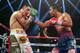 MACAU - NOVEMBER 24: Manny Pacquiao (R) of the Philippines punches Brandon Rios of the U.S. during their 'Clash in Cotai' WBO International Welterweight title fight on November 24, 2013 in Macau. (Photo by Nicky Loh/Getty Images)