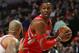 CHICAGO, IL - MARCH 13: Dwight Howard #12 of the Houston Rockets looks to pass over carlos Boozer #5 of the Chicago Bulls at the United Center on March 13, 2014 in Chicago, Illinois. NOTE TO USER: User expressly acknowledges and agrees that, by downloadi