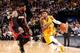 INDIANAPOLIS, IN - MARCH 26: Paul George #24 of the Indiana Pacers drives against LeBron James #6 of the Miami Heat during a game on March 26, 2014 at Bankers Life Fieldhouse in Indianapolis, IN. NOTE TO USER: User expressly acknowledges and agrees that,
