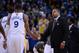 April 4, 2014; Oakland, CA, USA; Golden State Warriors head coach Mark Jackson (right) high-fives forward Andre Iguodala (9) during the second quarter against the Sacramento Kings at Oracle Arena. The Warriors defeated the Kings 102-69. Mandatory Credit: